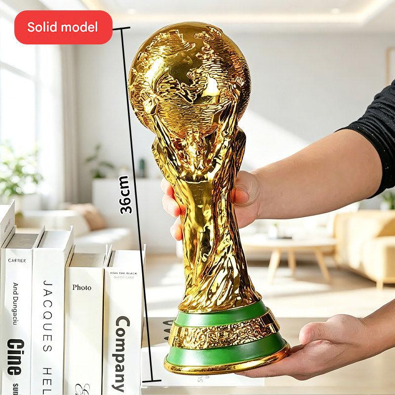 FIFA World Cup trophy with a glossy gold finish and luxurious design.