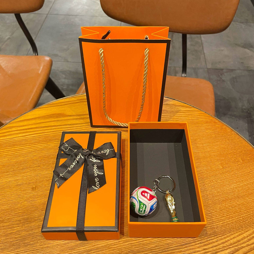 FIFA football and World Cup trophy design medal with a premium gift box