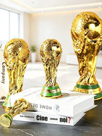 FIFA World Cup trophy with a glossy gold finish and luxurious design.
