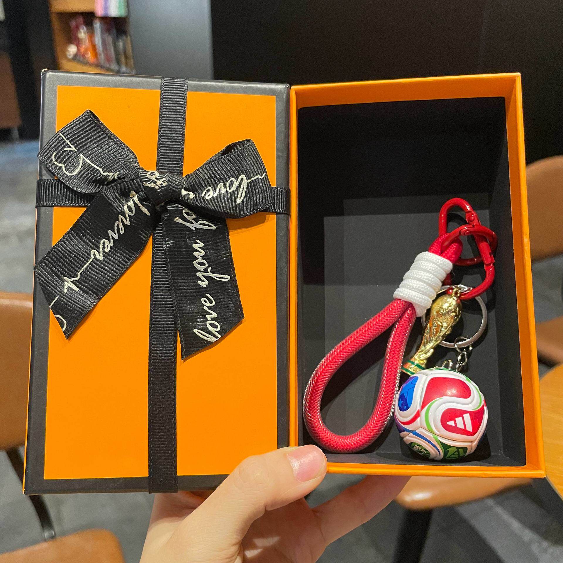 FIFA football and World Cup trophy design medal with a premium gift box