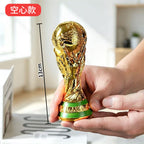 FIFA World Cup trophy with a glossy gold finish and luxurious design.