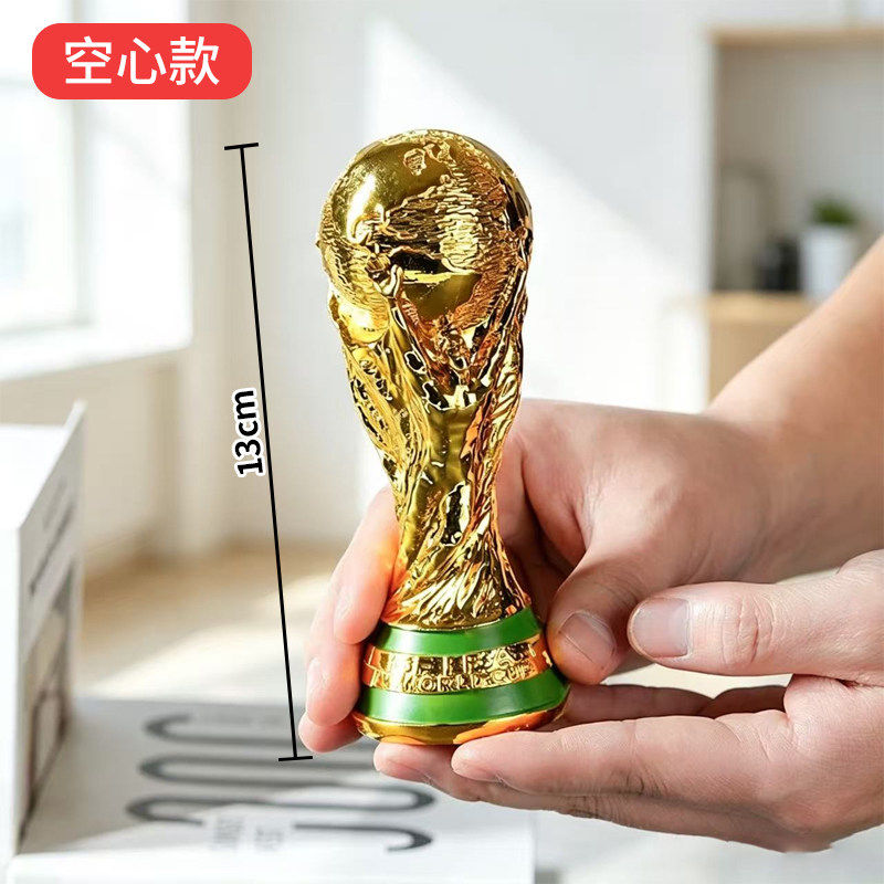 FIFA World Cup trophy with a glossy gold finish and luxurious design.