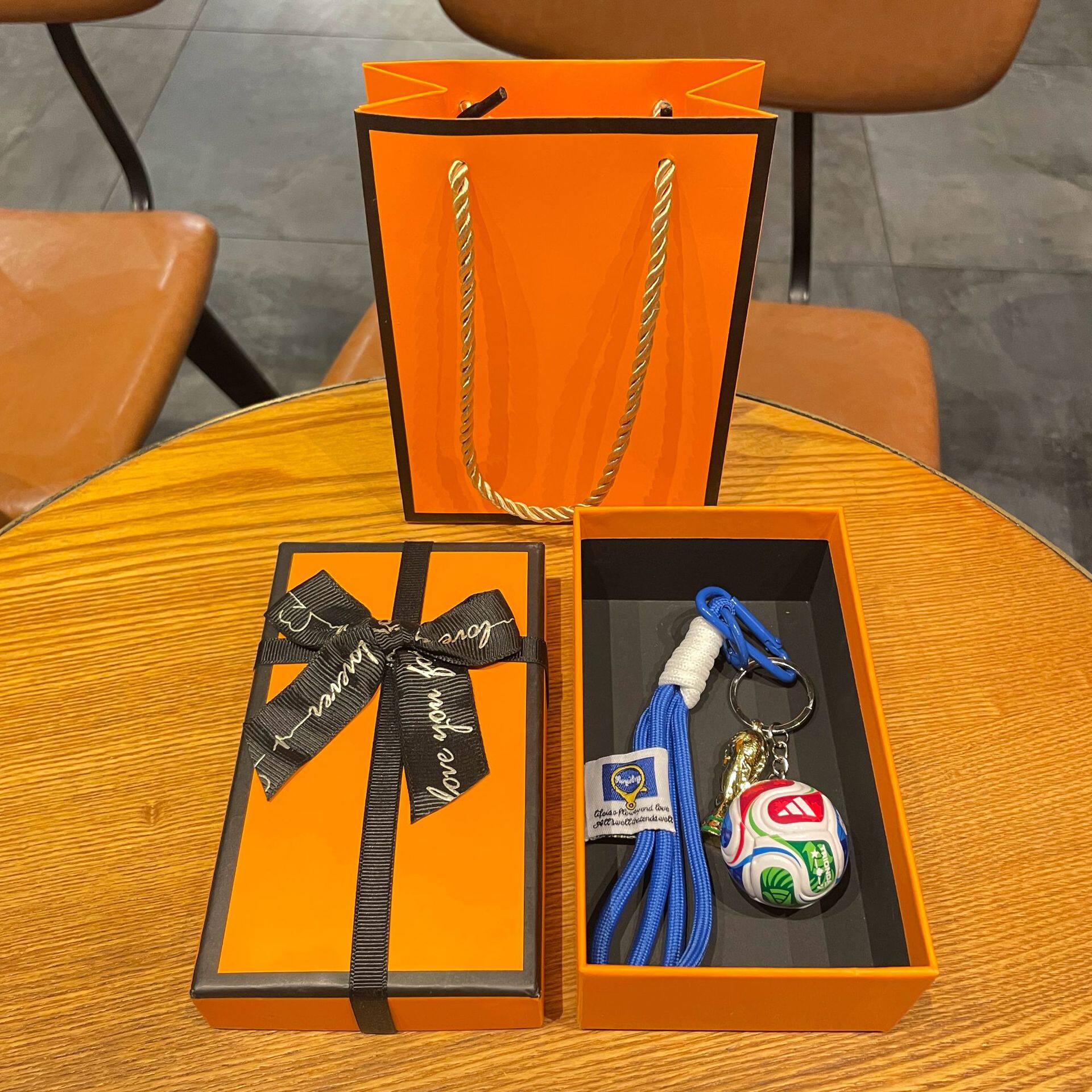 FIFA football and World Cup trophy design medal with a premium gift box