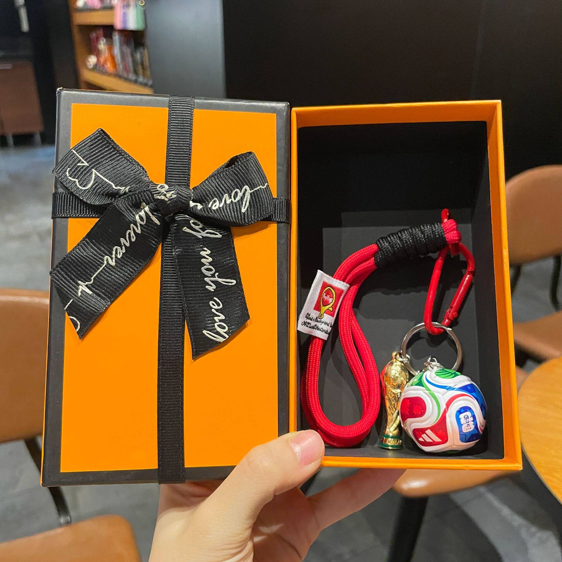 FIFA football and World Cup trophy design medal with a premium gift box