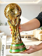 FIFA World Cup trophy with a glossy gold finish and luxurious design.