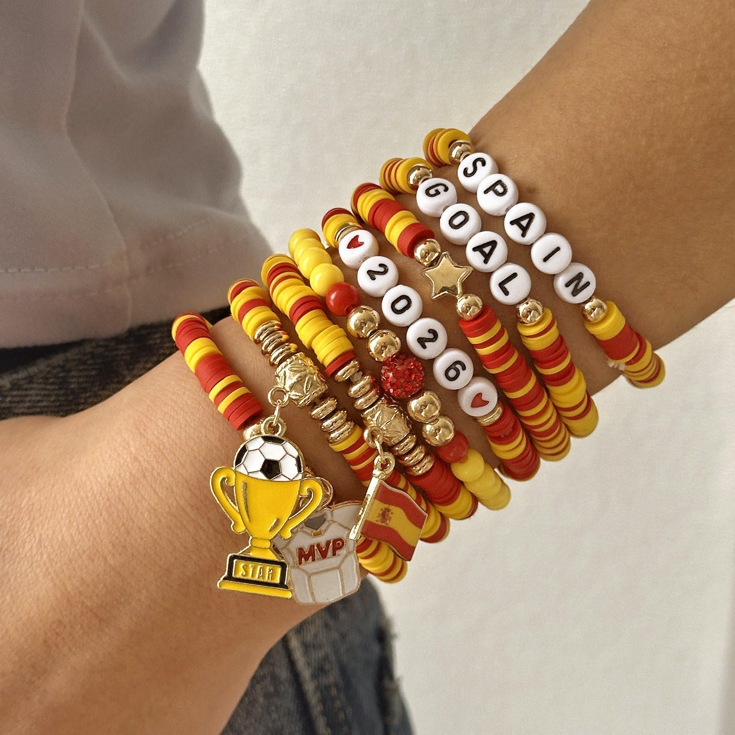 A trendy beaded bracelet with a distinctive sporty design for soccer lovers.