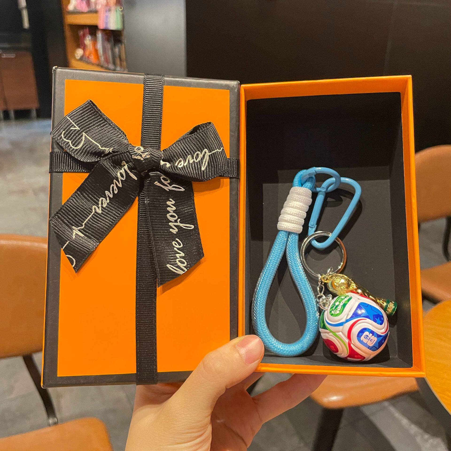 FIFA football and World Cup trophy design medal with a premium gift box