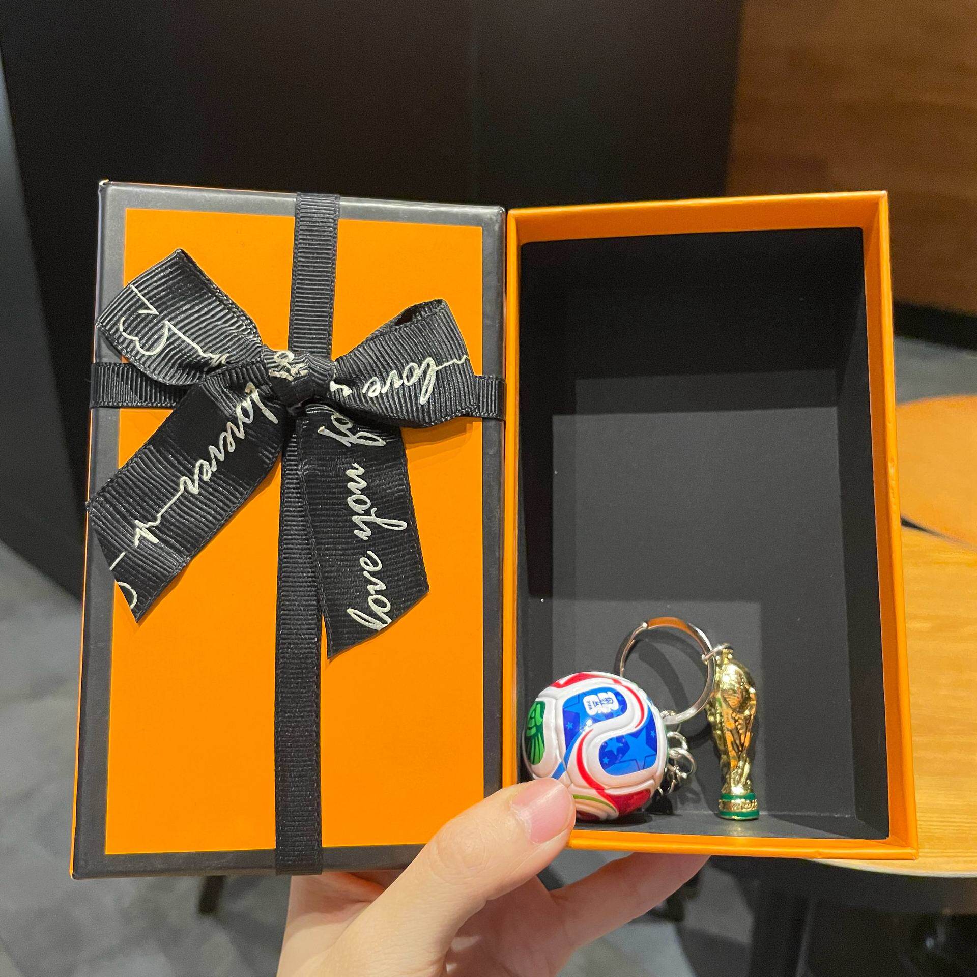 FIFA football and World Cup trophy design medal with a premium gift box
