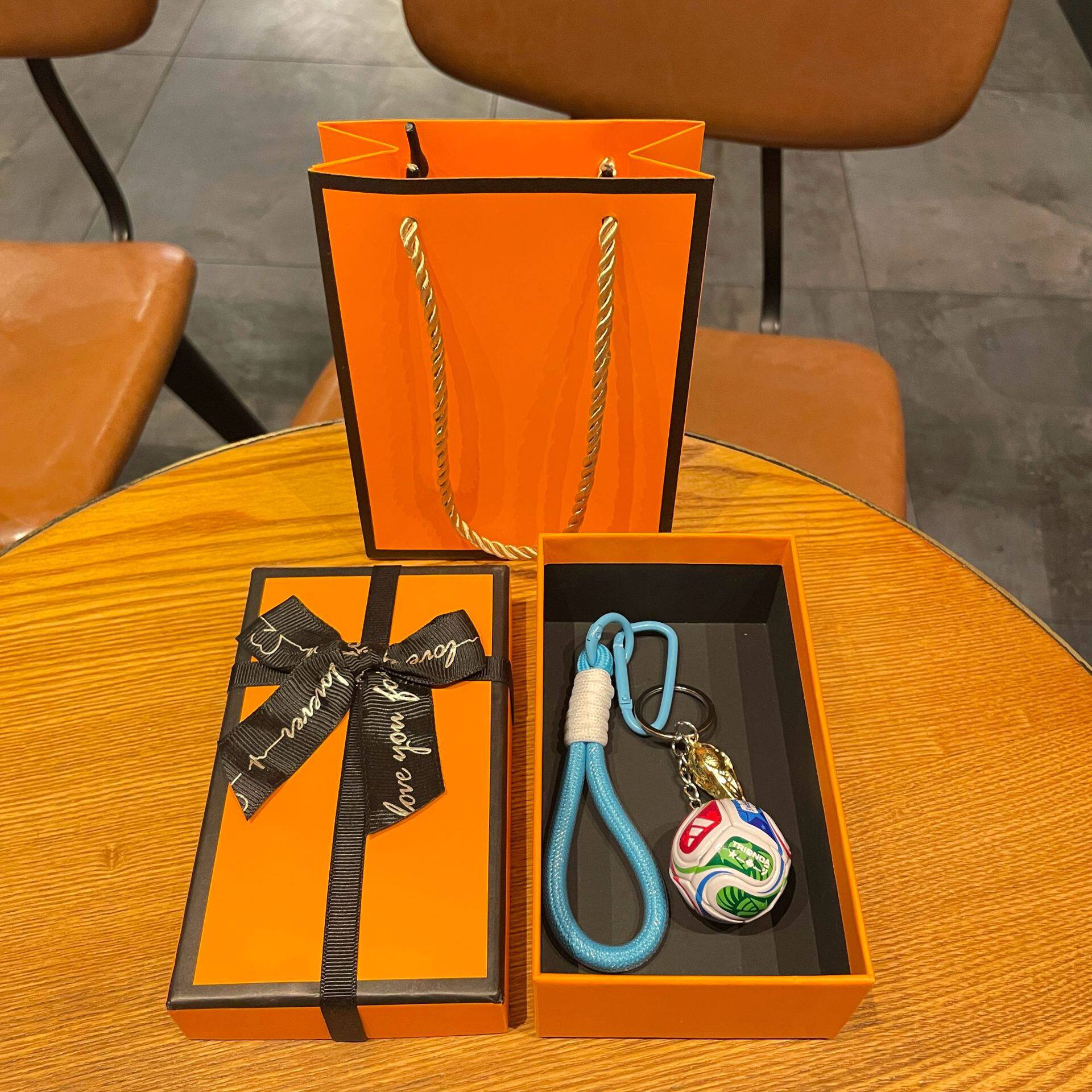 FIFA football and World Cup trophy design medal with a premium gift box