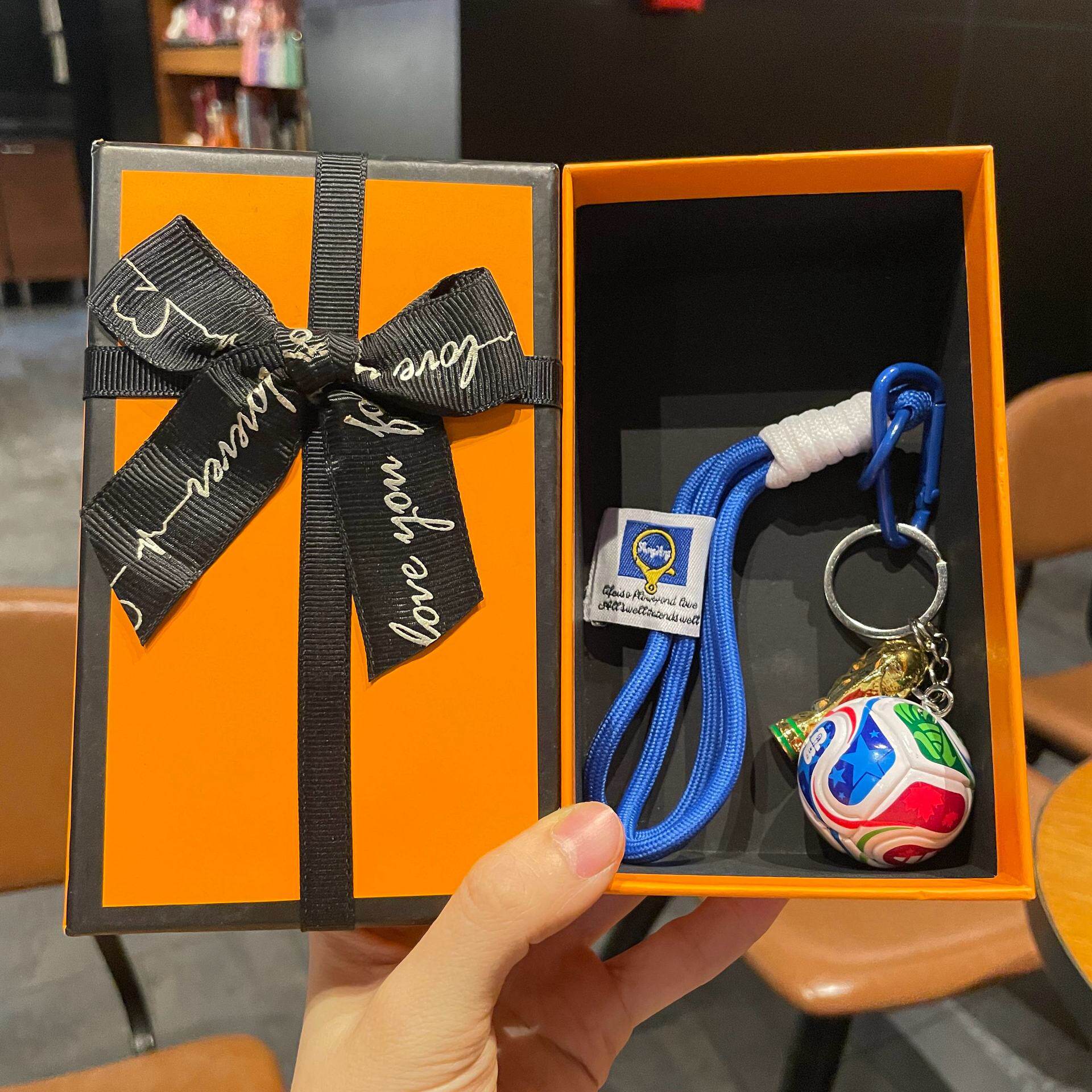 FIFA football and World Cup trophy design medal with a premium gift box