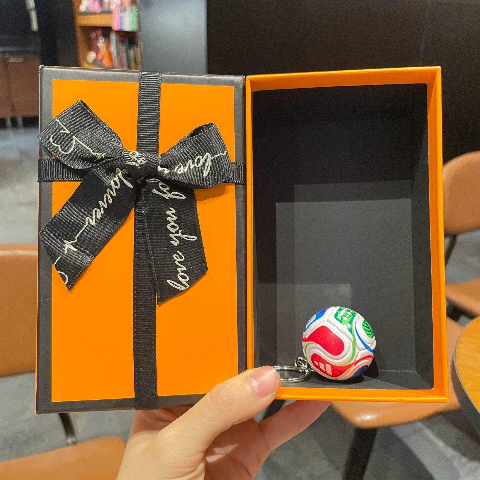 FIFA football and World Cup trophy design medal with a premium gift box