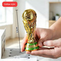 FIFA World Cup trophy with a glossy gold finish and luxurious design.